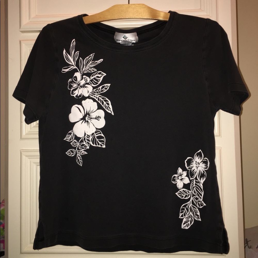Erin London black shirt with white flowers.